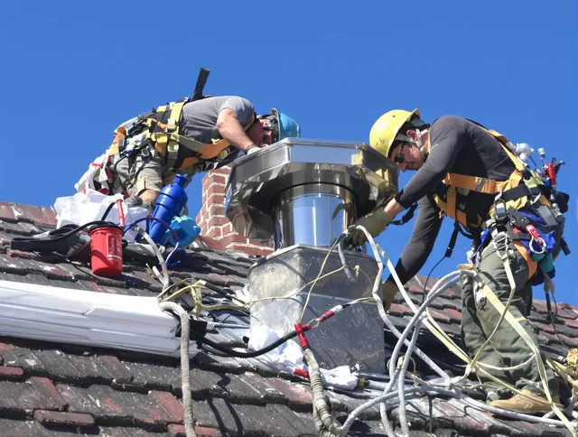 Protective chimney cap installed by Heath Chimney Sweep in Heath, OH
