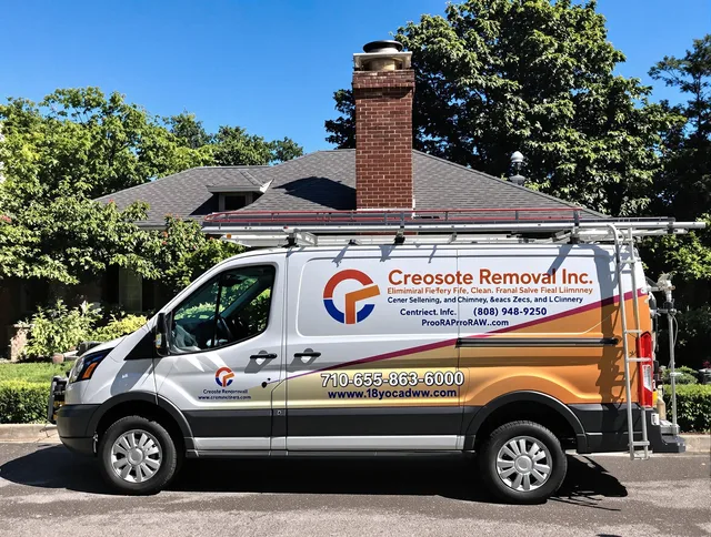 Heath Chimney Sweep technician removing creosote safely in Heath, OH