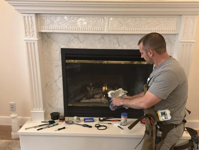 Heath Chimney Sweep performing fireplace maintenance in Heath, OH