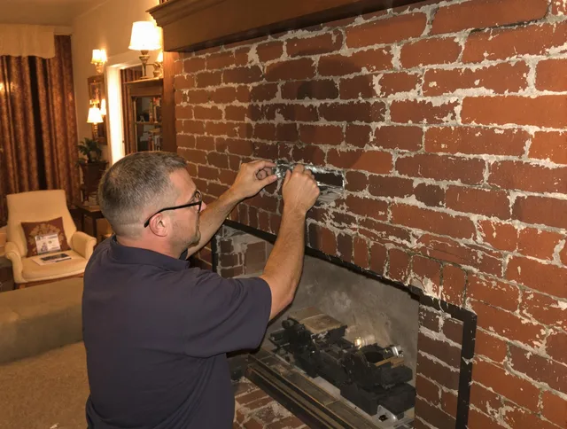 Heath Chimney Sweep expert fixing a fireplace in Heath, OH